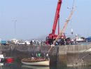 Stepping the mast.